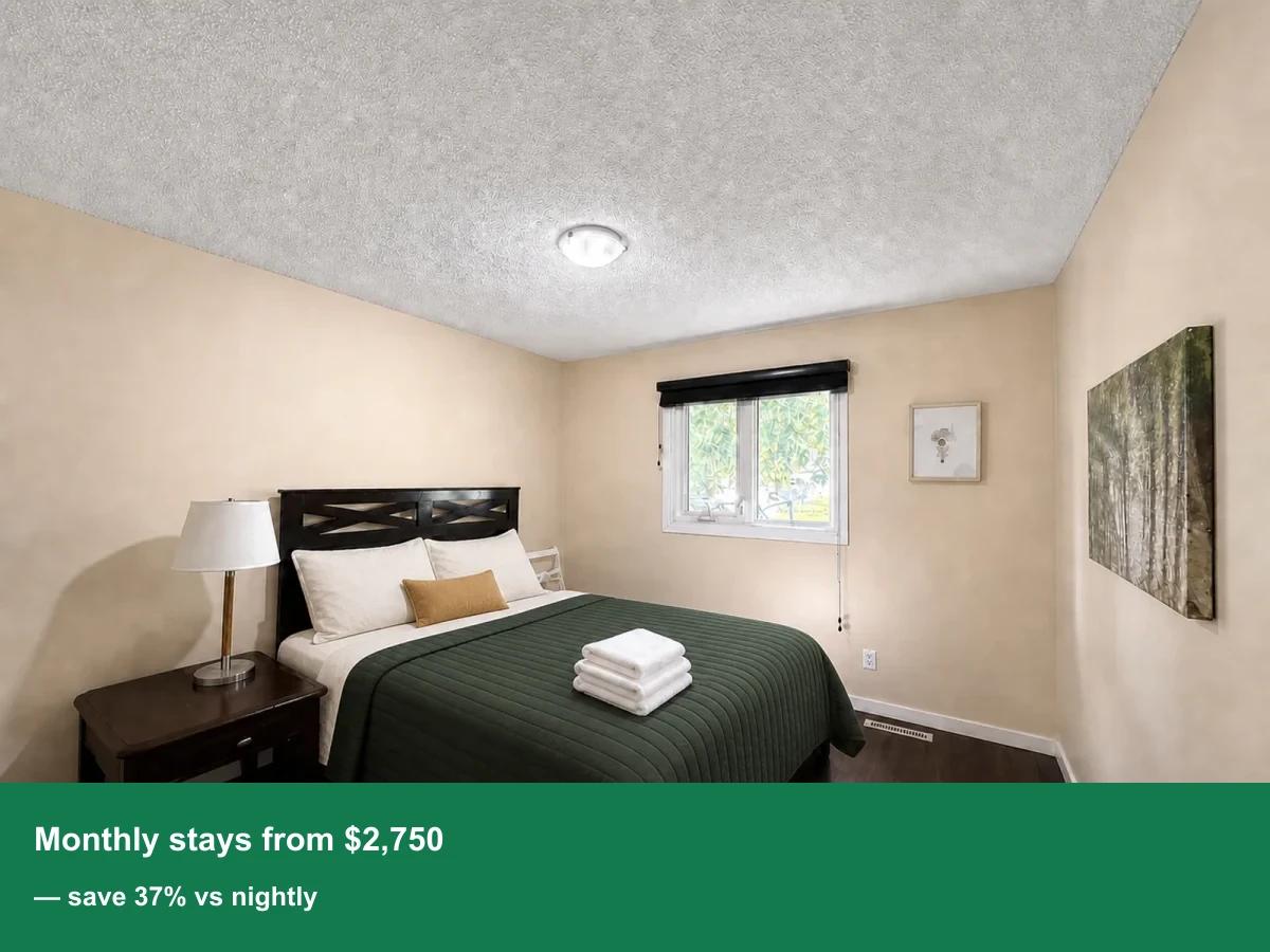 AI-enhanced photo of a furnished bedroom in the Huntington Hills three-bedroom home