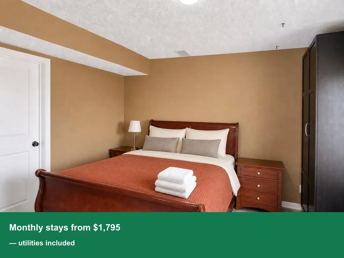AI-enhanced photo of the furnished bedroom in the Sandstone two-bedroom suite