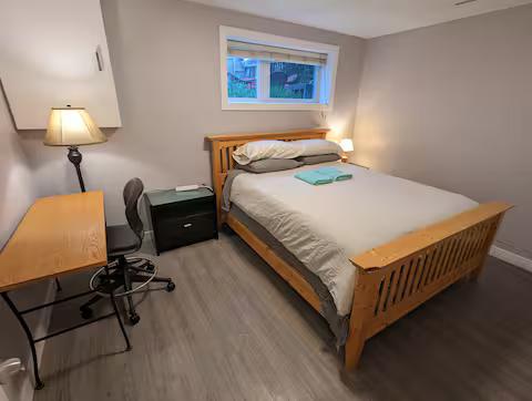 2BR Lower Suite | Shared Fenced Yard photo 2