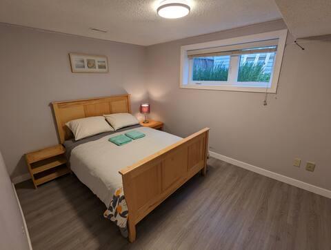 2BR Lower Suite | Shared Fenced Yard photo 15